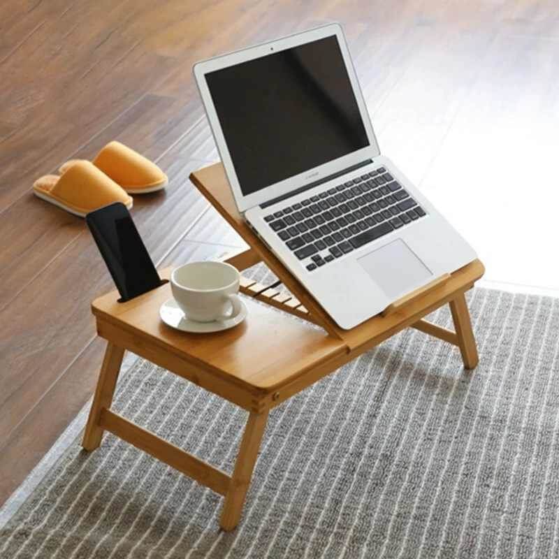 Bạn có thể dễ dàng di chuyển bàn làm việc trên giường 